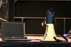 Megaphone next to a laptop. " Flickr " .