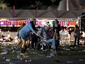Man Sitting in Wheel Chair After Shooting