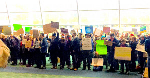 photo of people holding signs