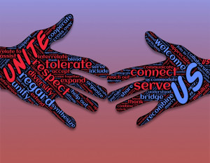 Two hands with words on them about to shake. "Pixabay".