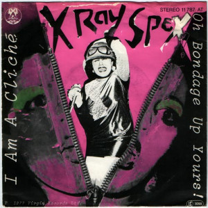 Poly Styrene wearing an army helmet